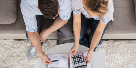 Couple reviewing paperwork